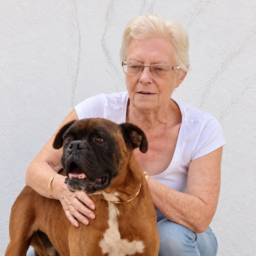 Linda with a boxer dog